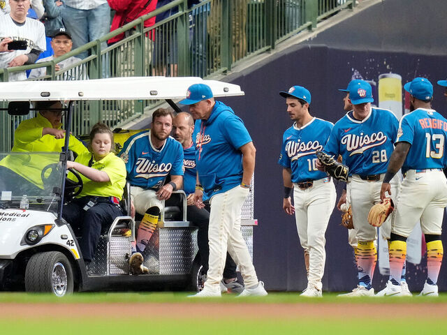 MILWAUKEE, WISCONSIN - MAY 08: Brandon Lockridge #20 of the Milwaukee Brewers is carted off the field after colliding into the wall attempting a catch in the fourth inning against the New York Yankees at American Family Field on May 08, 2026 in Milwaukee, Wisconsin.