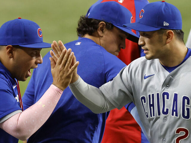 ARLINGTON, TEXAS - MAY 8: Seiya Suzuki #27 of the Chicago Cubs celebrates with teammates following the team's win over the Texas Rangers at Globe Life Field on May 8, 2026 in Arlington, Texas.