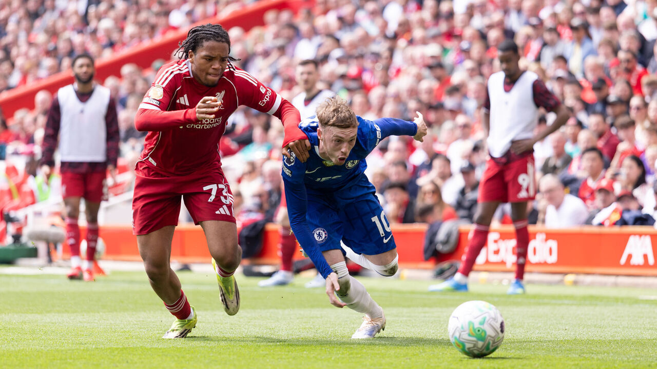 LIVERPOOL, ENGLAND - MAY 9: Cole Palmer of Chelsea is challenged by Rio Ngumoha of Liverpool during the Premier League match between Liverpool and Chelsea at Anfield on May 9, 2026 in Liverpool, England.