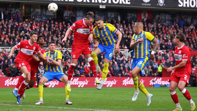 MIDDLESBROUGH, ENGLAND - MAY 09: Taylor Harwood-Bellis of Southampton creates a headed chance under pressure from Luke Ayling of Middlesbrough during the Sky Bet Championship Play Off Semi Final Second Leg match between Middlesbrough and Southampton at Riverside Stadium on May 09, 2026 in Middlesbrough, England.