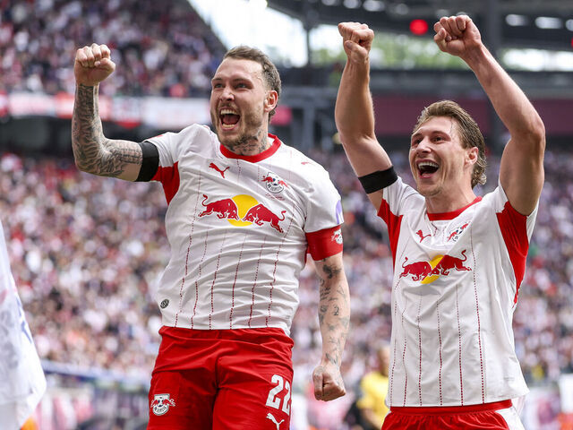 dpatop - 09 May 2026, Saxony, Leipzig: Soccer, Men: Bundesliga, RB Leipzig - FC St. Pauli, Matchday 33, Red Bull Arena. Willi Orban (r, RB Leipzig) and David Raum (RB Leipzig) celebrate after Orban's goal to make it 2-0. Photo: Jan Woitas/dpa - IMPORTANT NOTE: In accordance with the regulations of the DFL German Football League and the DFB German Football Association, it is prohibited to utilize or have utilized photographs taken in the stadium and/or of the match in the form of sequential images and/or video-like photo series.