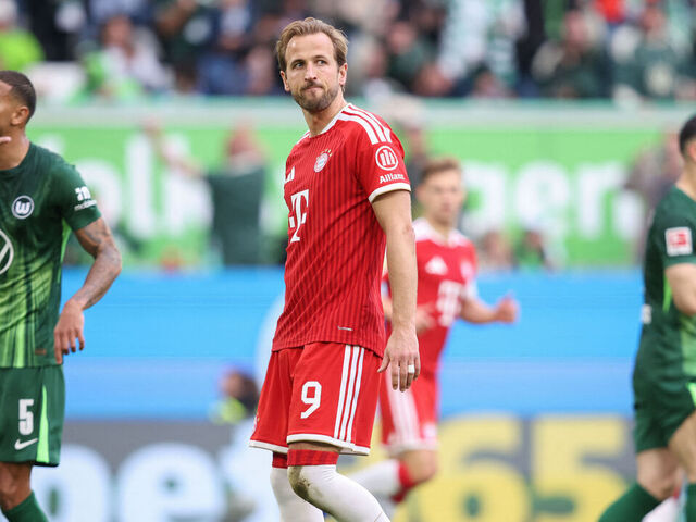 Bayern Munich's English forward #09 Harry Kane reacts after missing a penalty during the German first division Bundesliga football match between VfL Wolfsburg and FC Bayern Munich in Wolfsburg, on May 9, 2026. / DFL REGULATIONS PROHIBIT ANY USE OF PHOTOGRAPHS AS IMAGE SEQUENCES AND/OR QUASI-VIDEO