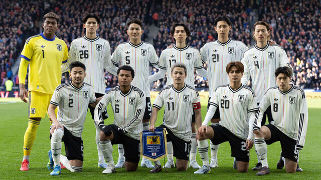 GLASGOW, SCOTLAND - MARCH 28: (Back row from l-r) Zion Suzuki, Keisuke Goto, Tsuyoshi Watanabe, Ao Tanaka, Hiroki Ito, Ayumu Seko, (front row from l-r) Yukinari Sugawara, Joel Chima Fujita, Daizen Maeda, Kodai Sano and Yuito Suzuki of Japan line up for the team photo prior to an international friendly match between Scotland and Japan at Hampden Park on March 28, 2026 in Glasgow, Scotland.