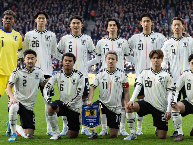GLASGOW, SCOTLAND - MARCH 28: (Back row from l-r) Zion Suzuki, Keisuke Goto, Tsuyoshi Watanabe, Ao Tanaka, Hiroki Ito, Ayumu Seko, (front row from l-r) Yukinari Sugawara, Joel Chima Fujita, Daizen Maeda, Kodai Sano and Yuito Suzuki of Japan line up for the team photo prior to an international friendly match between Scotland and Japan at Hampden Park on March 28, 2026 in Glasgow, Scotland.