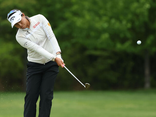 WEST CALDWELL, NEW JERSEY - MAY 09: Jeeno Thitikul of Thailand chips onto the 18th green during the third round of the Mizuho Americas Open 2026 at Mountain Ridge Country Club on May 09, 2026 in West Caldwell, New Jersey.