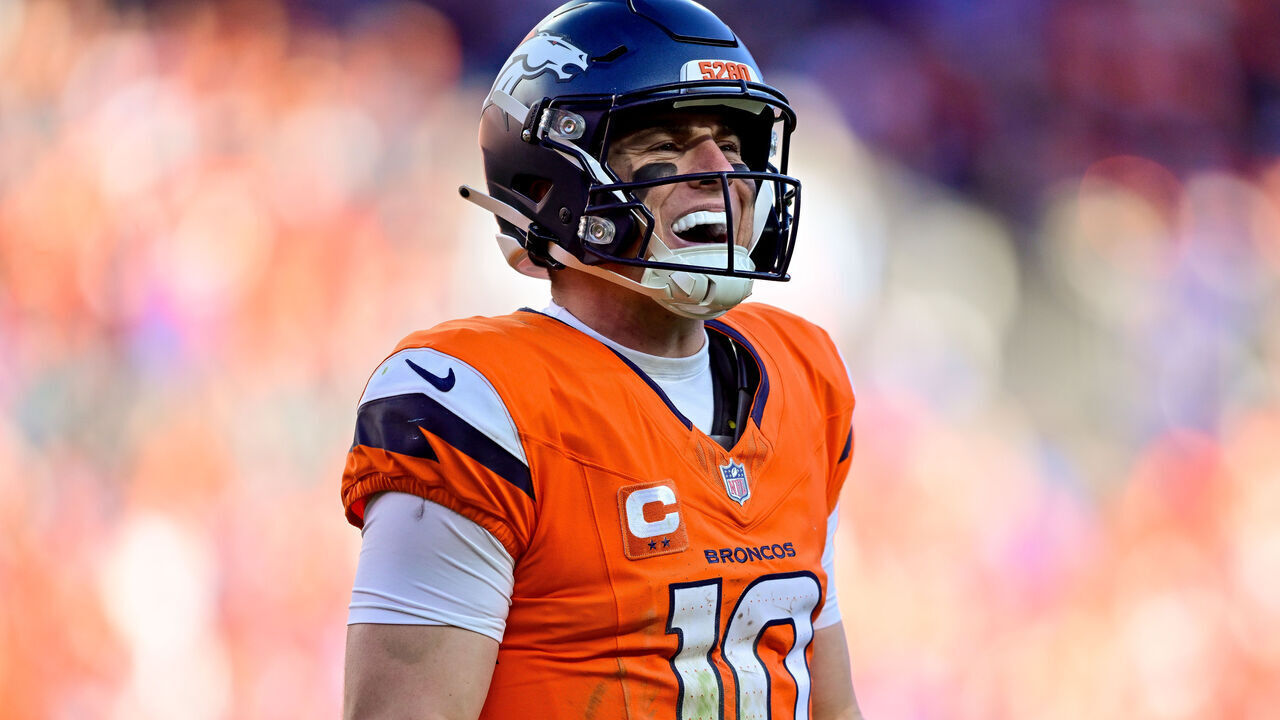 DENVER, CO - JANUARY 17: Denver Broncos quarterback Bo Nix (10) reacts after a play in the second quarter against the Buffalo Bills in the AFC Divisional Round game at Empower Field at Mile High on January 17, 2026 in Denver, Colorado.