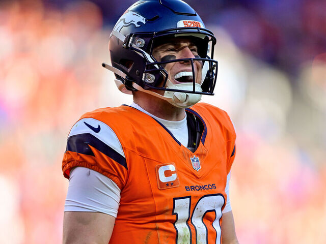 DENVER, CO - JANUARY 17: Denver Broncos quarterback Bo Nix (10) reacts after a play in the second quarter against the Buffalo Bills in the AFC Divisional Round game at Empower Field at Mile High on January 17, 2026 in Denver, Colorado.