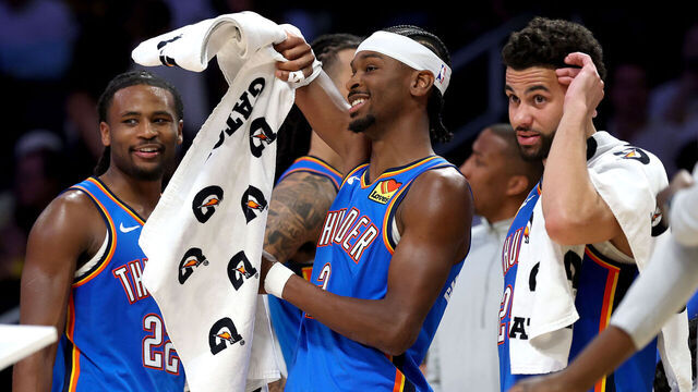 LOS ANGELES, CALIFORNIA - MAY 09: Cason Wallace #22, Shai Gilgeous-Alexander #2 and Ajay Mitchell #25 of the Oklahoma City Thunder celebrate from the bench against the Los Angeles Lakers during the fourth quarter in Game Three of the Second Round of the NBA Western Conference Playoffs at Crypto.com Arena on May 09, 2026 in Los Angeles, California.