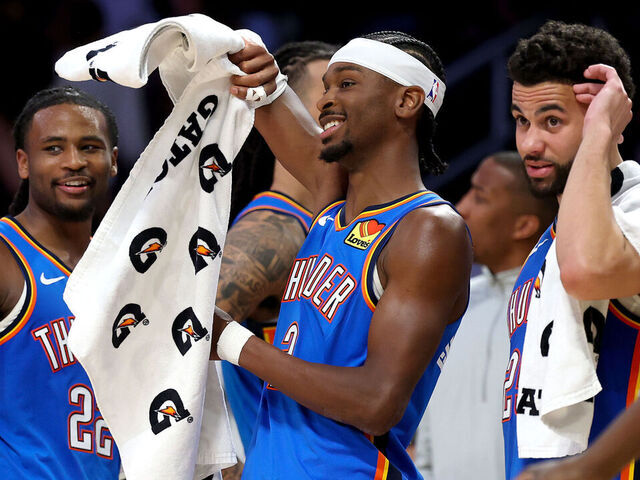 LOS ANGELES, CALIFORNIA - MAY 09: Cason Wallace #22, Shai Gilgeous-Alexander #2 and Ajay Mitchell #25 of the Oklahoma City Thunder celebrate from the bench against the Los Angeles Lakers during the fourth quarter in Game Three of the Second Round of the NBA Western Conference Playoffs at Crypto.com Arena on May 09, 2026 in Los Angeles, California.