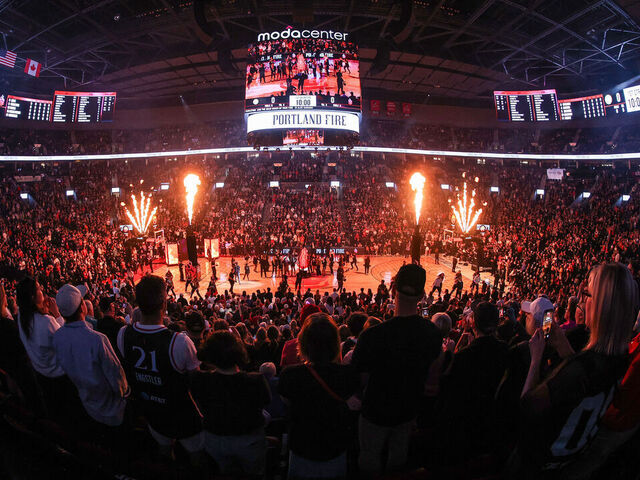 PORTLAND, OREGON - MAY 09: Fans watch Portland Fire player introductions against the Chicago Sky at Moda Center on May 09, 2026 in Portland, Oregon.