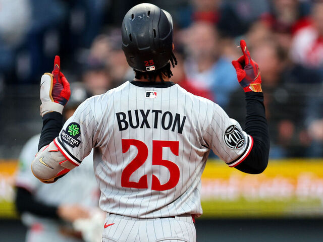 CLEVELAND, OH - MAY 09: Minnesota Twins center fielder Byron Buxton (25) celebrates as he crosses the plate after hitting a home run during the first inning of the Major League Baseball game between the Minnesota Twins and Cleveland Guardians on May 9, 2026, at Progressive Field in Cleveland, OH.