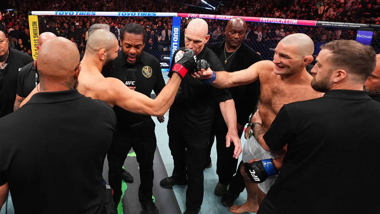 NEWARK, NEW JERSEY - MAY 09: (L-R) Khamzat Chimaev of Russia and Sean Strickland touch gloves prior to the UFC middleweight championship fight during the UFC 328 event at Prudential Center on May 09, 2026 in Newark, New Jersey.