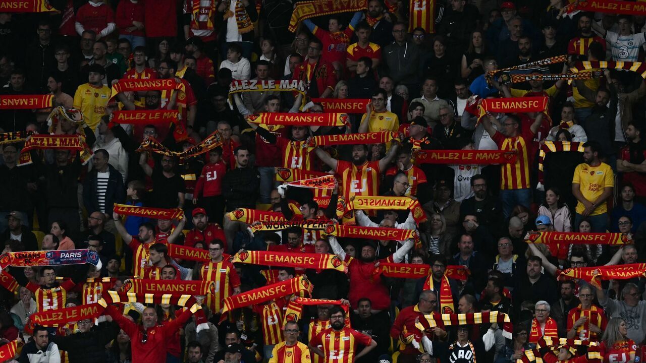 Le Mans supporters cheer their team on from the stands during the French L2 football match between Le Mans FC and Stade de Reims at the Stade Marie-Marvingt in Le Mans on May 2, 2026.