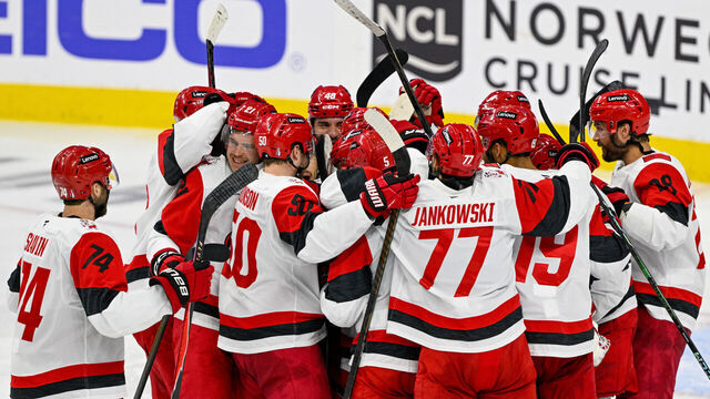 PHILADELPHIA , PA - MAY 09: Carolina Hurricanes teammates celebrate after game four of the NHL Stanley Cup Playoffs Second Round between the Philadelphia Flyers and the Carolina Hurricanes on May 7th, 2026 at the Xfinity Mobile Arena in Philadelphia, PA.