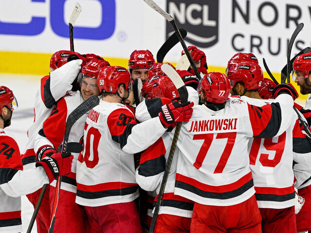 PHILADELPHIA , PA - MAY 09: Carolina Hurricanes teammates celebrate after game four of the NHL Stanley Cup Playoffs Second Round between the Philadelphia Flyers and the Carolina Hurricanes on May 7th, 2026 at the Xfinity Mobile Arena in Philadelphia, PA.