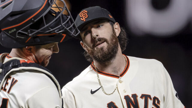 Ryan Walker (74) makes Patrick Bailey (14) smile after the San Francisco Giants defeated the Los Angeles Dodgers 3-0 at Oracle Park in San Francisco, on Wednesday, April 22, 2026.