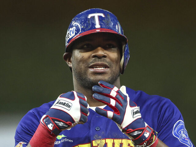 MIAMI, FLORIDA - FEBRUARY 6: Yasiel Puig of Tiburones de La Guaira of Venezuela reacts while standing on first base in the sixth inning during a game between Panama and Venezuela as part of Serie del Caribe 2024 at loanDepot park on February 6, 2024 in Miami, Florida.