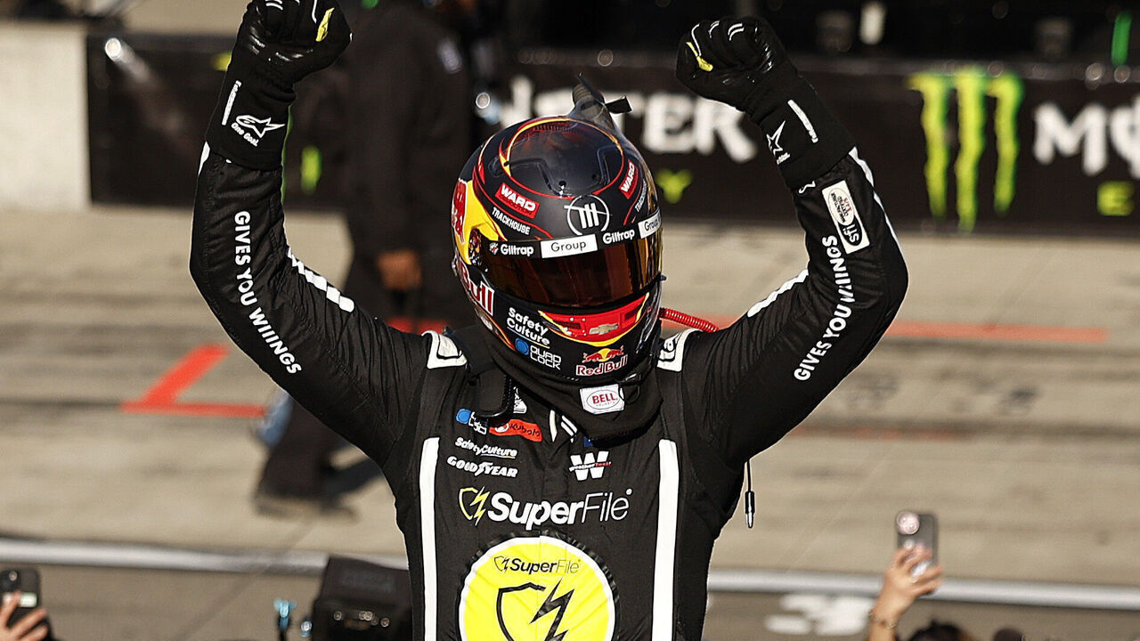 WATKINS GLEN, NEW YORK - MAY 10: Shane Van Gisbergen, driver of the #97 Superfile Chevrolet, celebrates after winning the NASCAR Cup Series Go Bowling at The Glen at Watkins Glen International on May 10, 2026 in Watkins Glen, New York.