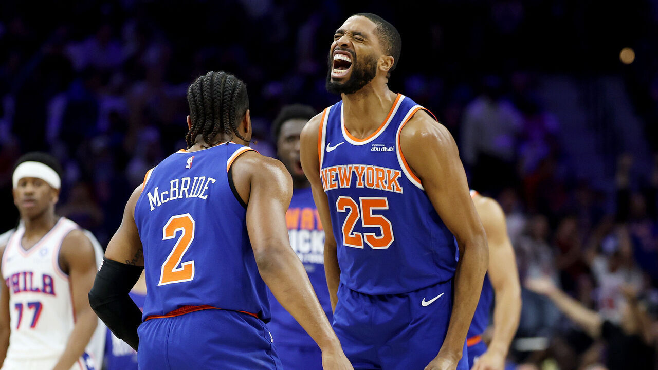 PHILADELPHIA, PENNSYLVANIA - MAY 10: Miles McBride #2 and Mikal Bridges #25 of the New York Knicks celebrate after McBride's 3-pointer against the Philadelphia 76ers during the first quarter in Game Four of the Second Round of the NBA Eastern Conference Playoffs at Xfinity Mobile Arena on May 10, 2026 in Philadelphia, Pennsylvania.