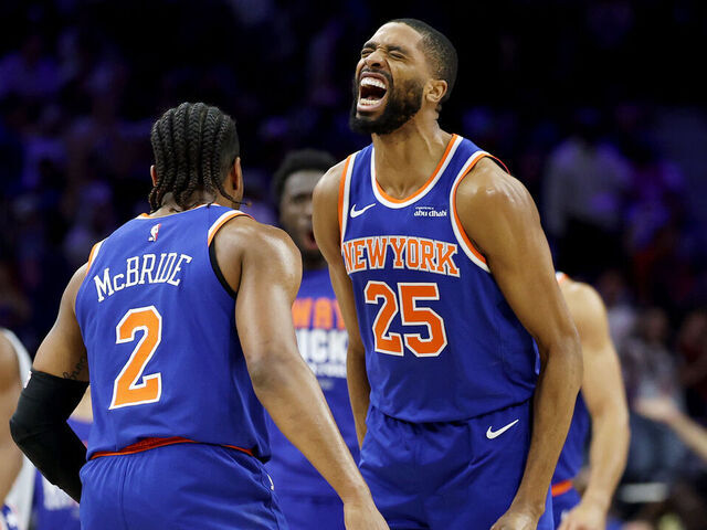 PHILADELPHIA, PENNSYLVANIA - MAY 10: Miles McBride #2 and Mikal Bridges #25 of the New York Knicks celebrate after McBride's 3-pointer against the Philadelphia 76ers during the first quarter in Game Four of the Second Round of the NBA Eastern Conference Playoffs at Xfinity Mobile Arena on May 10, 2026 in Philadelphia, Pennsylvania.