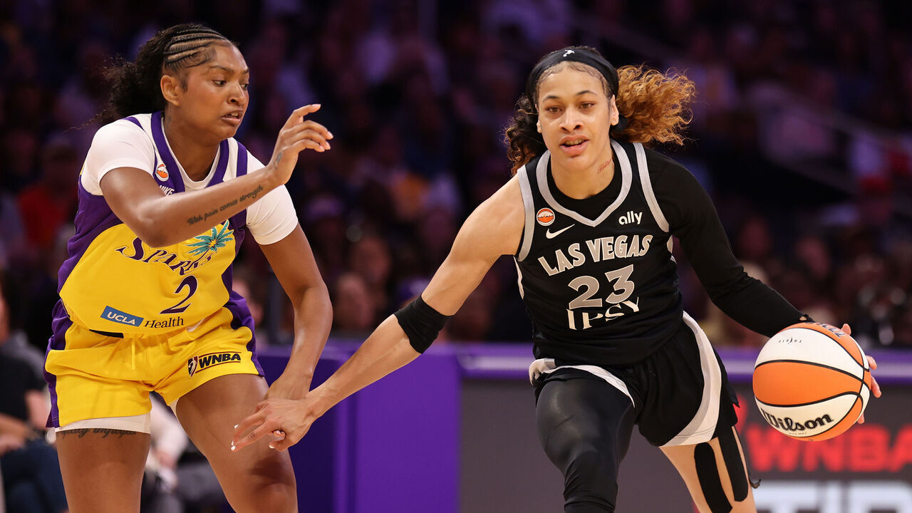 LOS ANGELES, CALIFORNIA - MAY 10: Chennedy Carter #23 of the Las Vegas Aces plays the ball against Chance Gray #2 of the Los Angeles Sparks during the first half of their game at Crypto.com Arena on May 10, 2026 in Los Angeles, California.