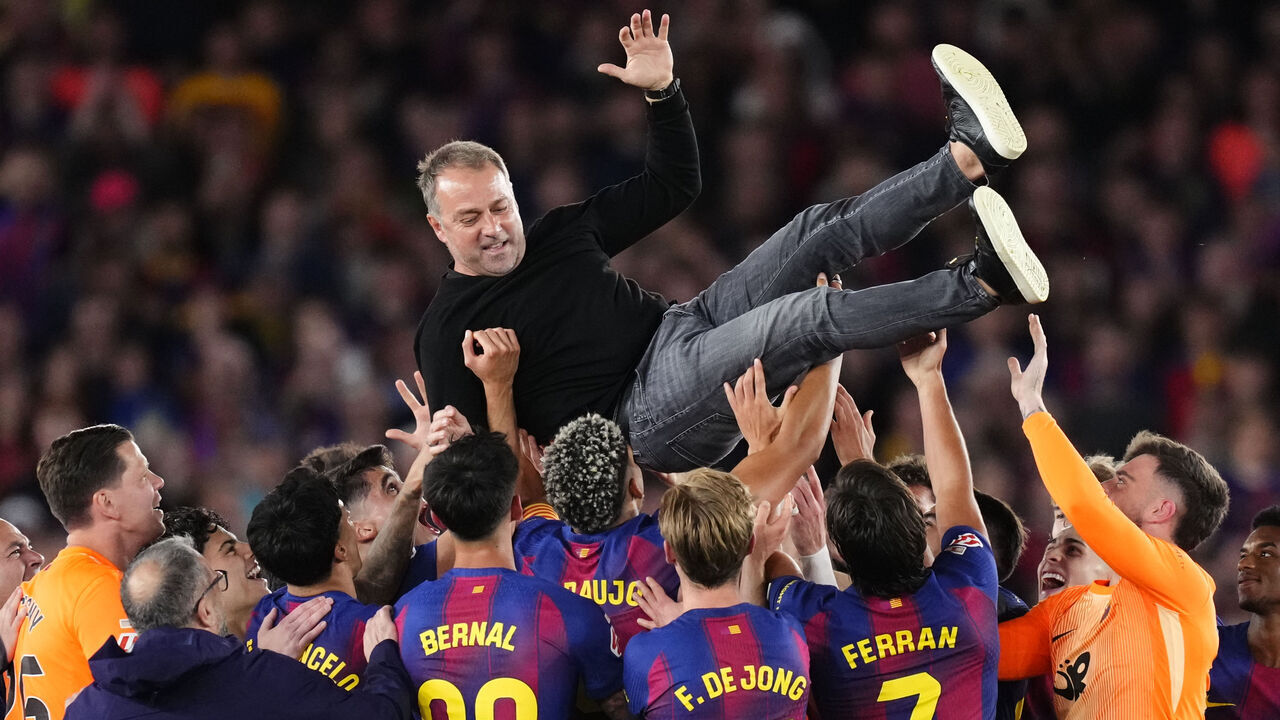 Hansi Flick head coach of Barcelona celebrates with his team the victory after winning during the LaLiga EA Sports match between FC Barcelona and Real Madrid CF at Spotify Camp Nou on May 10, 2026 in Barcelona, Spain.