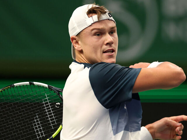 STOCKHOLM, SWEDEN - OCTOBER 18: Holger Rune of Denmark plays a forehand against Ugo Humbert of France during the Men's Singles semi-final match on day eight of the BNP Paribas Nordic Open 2025 at Royal Tennis Hall on October 18, 2025 in Stockholm, Sweden.