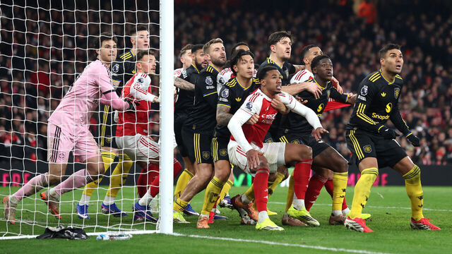 LONDON, ENGLAND - JANUARY 25: Gabriel of Arsenal is held by Lisandro Martinez of Manchester United for an oncoming corner during the Premier League match between Arsenal and Manchester United at Emirates Stadium on January 25, 2026 in London, England.