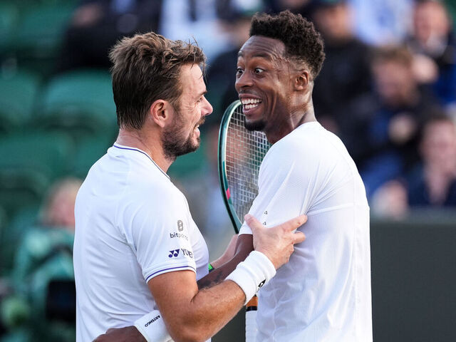 LONDON, ENGLAND - JULY 03: Stan Wawrinka (L) of Switzerland speaks to Gael Monfils of France in the Men's Singles Second Round match during day three of The Championships Wimbledon 2024 at All England Lawn Tennis and Croquet Club on July 03, 2024 in London, England.