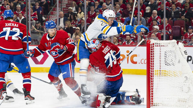 MONTREAL, CANADA- MAY 10: Beck Malenstyn #29 of the Buffalo Sabres collides with Jakub Dobes #75 of the Montreal Canadiens during the second period of Game Three of the Second Round of the 2026 Stanley Cup Playoffs between the Montreal Canadiens and the Buffalo Sabres at the Bell Centre on May 10, 2026 in Montreal, Quebec, Canada.