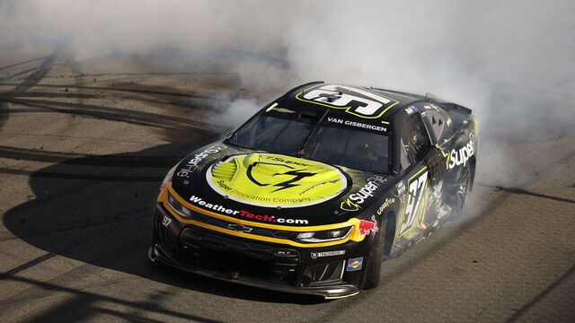 WATKINS GLEN, NEW YORK - MAY 10: Shane Van Gisbergen, driver of the #97 Superfile Chevrolet, celebrates with a burnout after winning the NASCAR Cup Series Go Bowling at The Glen at Watkins Glen International on May 10, 2026 in Watkins Glen, New York.
