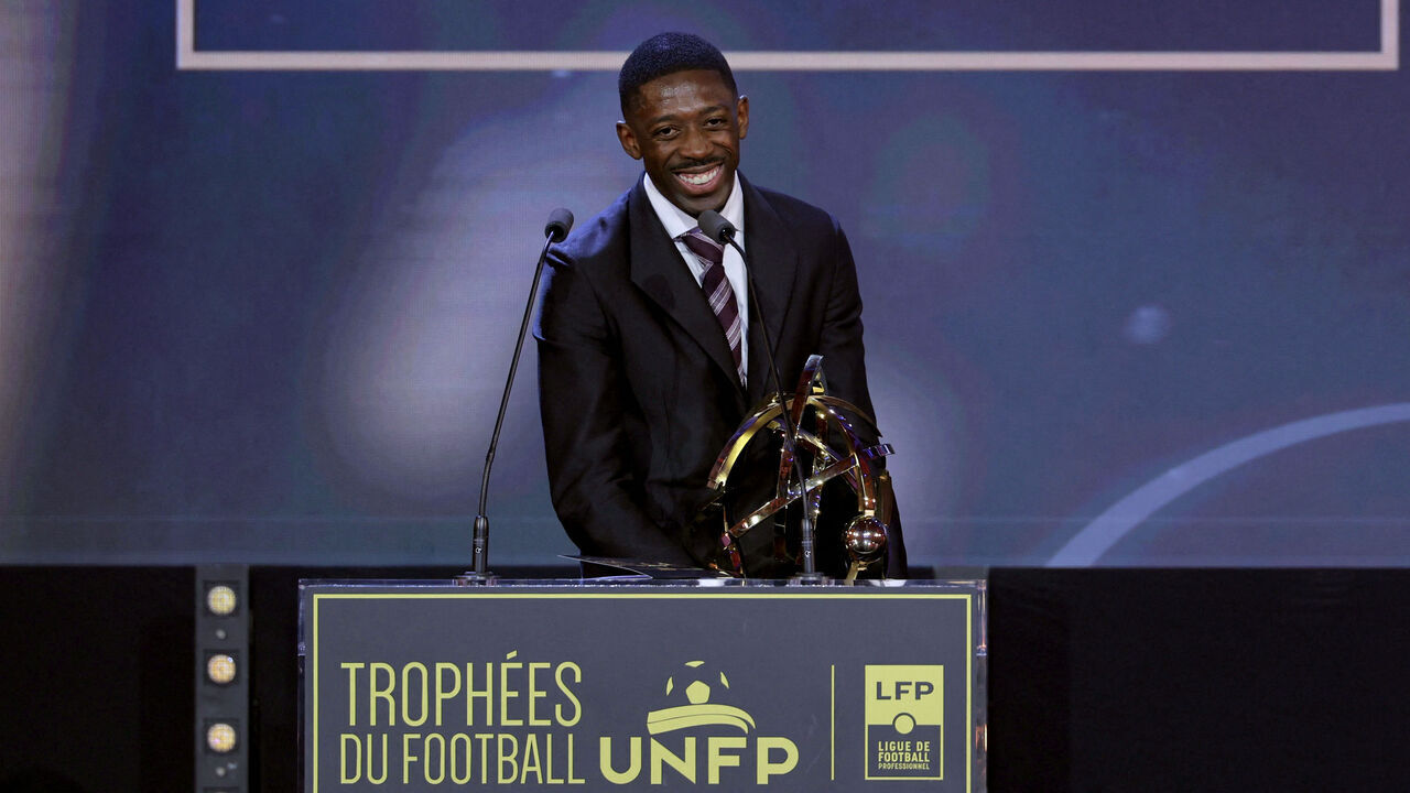 Paris Saint-Germain's French forward #10 Ousmane Dembele receives the Ligue 1 best player award during the 34th UNFP's (France's professional players union) French football awards ceremony in Paris on May 11, 2026.