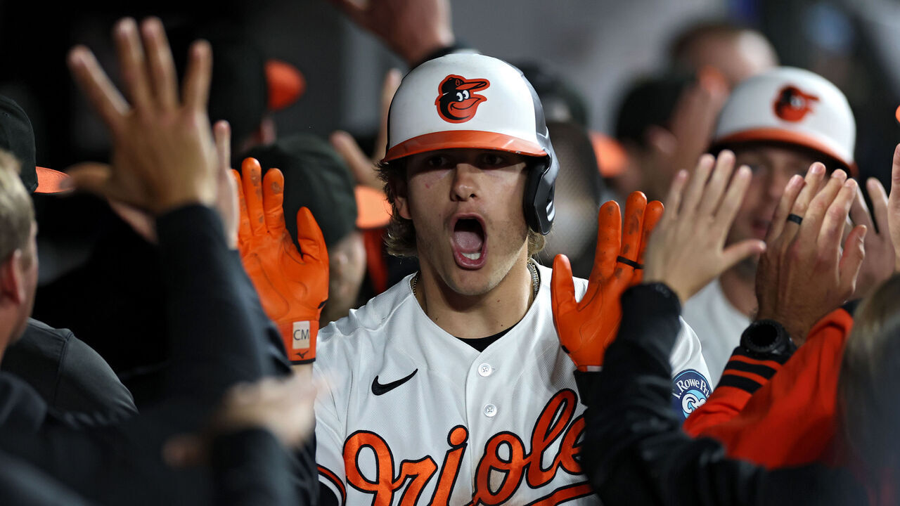 BALTIMORE, MARYLAND - MAY 11: Coby Mayo #16 of the Baltimore Orioles celebrates in the dugout with teammates after hitting a three run home run against the New York Yankees during the seventh inning at Oriole Park at Camden Yards on May 11, 2026 in Baltimore, Maryland.