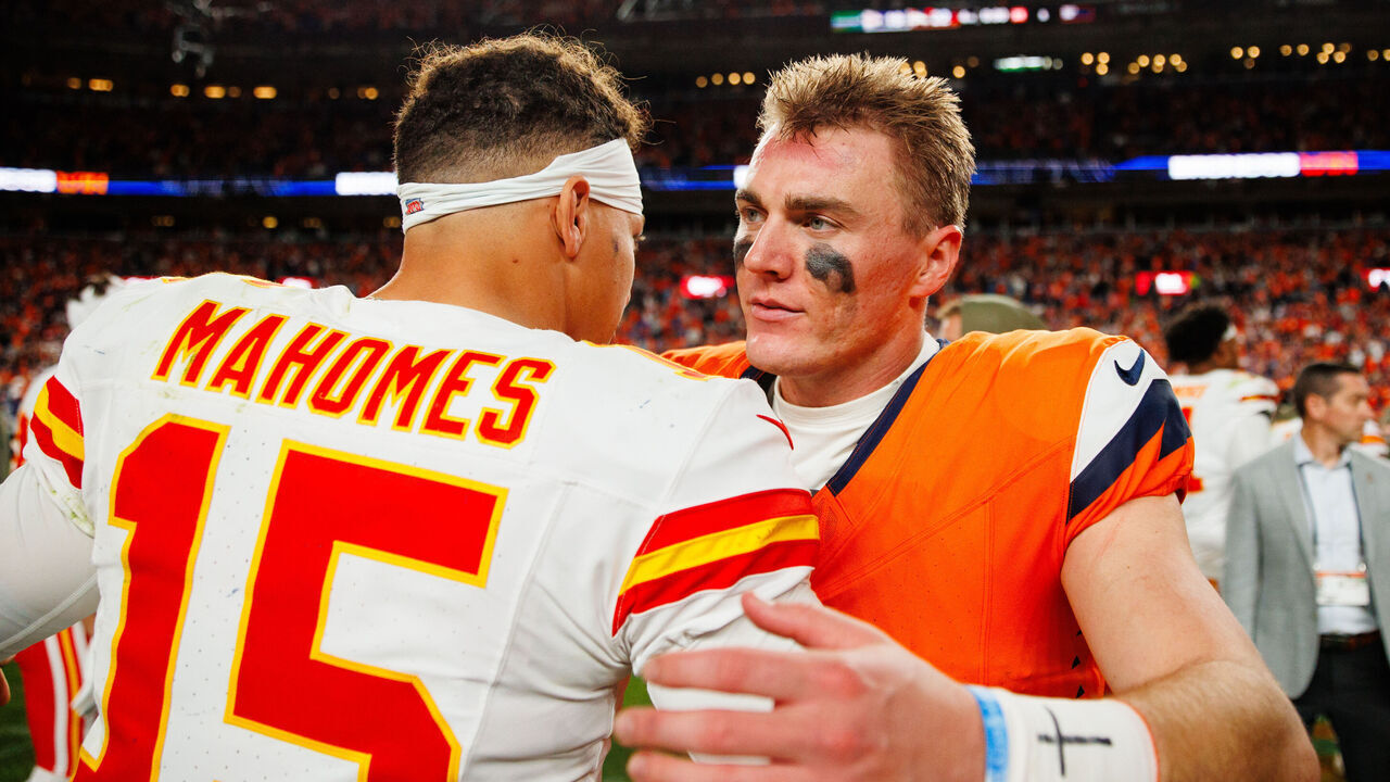 DENVER, CO - NOVEMBER 16: Patrick Mahomes #15 of the Kansas City Chiefs and Bo Nix #10 of the Denver Broncos talk after the game at Empower Field at Mile High on November 16, 2025 in Denver, Colorado.