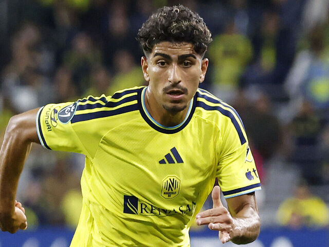 NASHVILLE, TENNESSEE - APRIL 28: Ahmed Qasem #37 of Nashville SC dribbles the ball during the second half of the Semi-final of the CONCACAF Champions Cup against Tigres UANL at GEODIS Park on April 28, 2026 in Nashville, Tennessee.