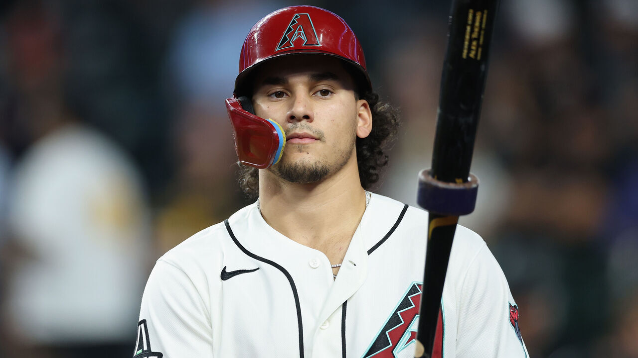 PHOENIX, ARIZONA - MAY 07: Alek Thomas #5 of the Arizona Diamondbacks on deck during the MLB game at Chase Field on May 07, 2026 in Phoenix, Arizona. The Pirates defeated the Diamondbacks 4-2.