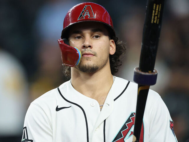 PHOENIX, ARIZONA - MAY 07: Alek Thomas #5 of the Arizona Diamondbacks on deck during the MLB game at Chase Field on May 07, 2026 in Phoenix, Arizona. The Pirates defeated the Diamondbacks 4-2.