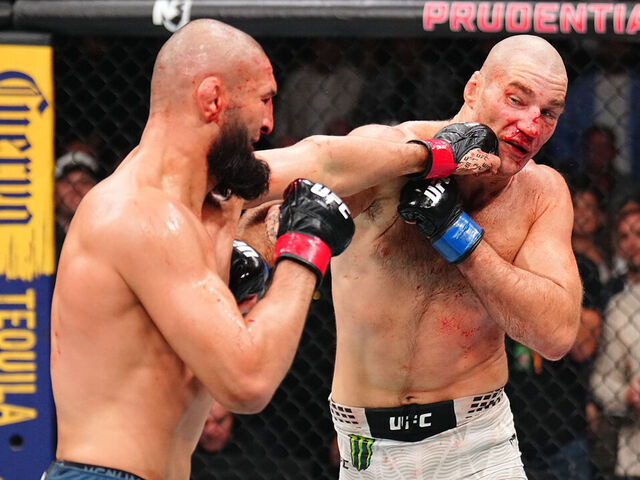 NEWARK, NEW JERSEY - MAY 09: (R-L) Sean Strickland and Khamzat Chimaev of Russia trade punches in the UFC middleweight championship fight during the UFC 328 event at Prudential Center on May 09, 2026 in Newark, New Jersey.