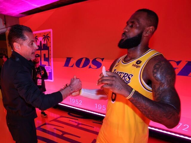 LOS ANGELES, CA - MAY 9: LeBron James #6 of the Los Angeles Lakers greets Rob Pelinka after Round 2 Game 4 of the Western Conference Semi-Finals 2023 NBA Playoffs against the Golden State Warriors on May 9, 2023 at Crypto.Com Arena in Los Angeles, California. NOTE TO USER: User expressly acknowledges and agrees that, by downloading and/or using this Photograph, user is consenting to the terms and conditions of the Getty Images License Agreement. Mandatory Copyright Notice: Copyright 2023 NBAE