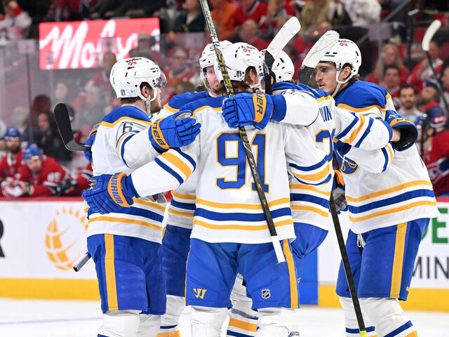MONTREAL, CANADA - MAY 12: Zach Benson #6 of the Buffalo Sabres celebrates with teammates after scoring a goal in the third period against the Montreal Canadiens in Game Four of the Second Round of the 2026 Stanley Cup Playoffs at Bell Centre on May 12, 2026 in Montreal, Quebec, Canada.