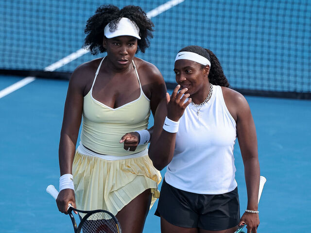 WASHINGTON, DC - JULY 21: Venus Williams and Hailey Baptiste interact during a women's doubles match against Eugenie Bouchard and Cleave Ngounoue (not pictured) on day 1 of the Mubadala Citi DC Open 2025 at William H.G. FitzGerald Tennis Center on July 21, 2025 in Washington, DC.