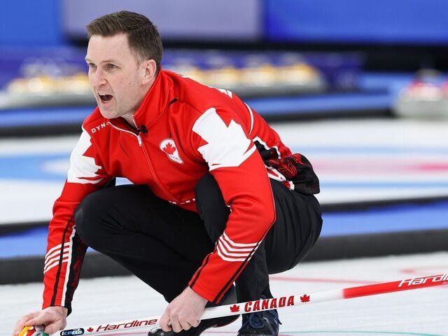 Brad Gushue of Canada competes during the curling man's bronze medal game of the Beijing 2022 Winter Olympics between Canada and the United States at the National Aquatics center in Beijing, China, Feb.18, 2022.