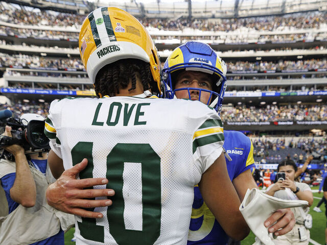 INGLEWOOD, CA - OCTOBER 6: Quarterback Jordan Love #10 of the Green Bay Packers and Quarterback Matthew Stafford #9 of the Los Angeles Rams interact after an NFL football game at SoFi Stadium on October 6, 2024 in Inglewood, California.