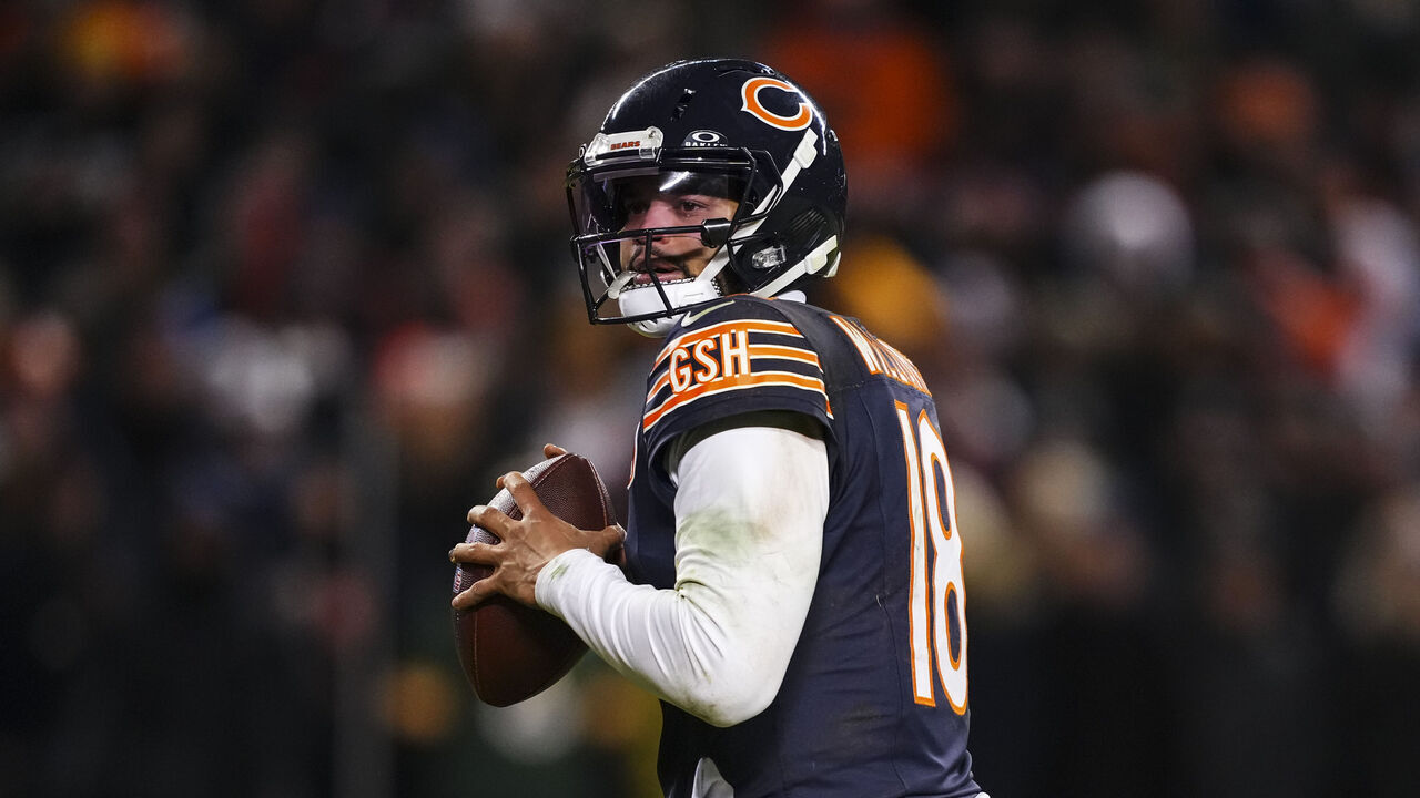 CHICAGO, IL - JANUARY 10: Caleb Williams #18 of the Chicago Bears drops back to pass during an NFC Wild Card Playoff game against the Green Bay Packers at Soldier Field on January 10, 2026 in Chicago, Illinois.