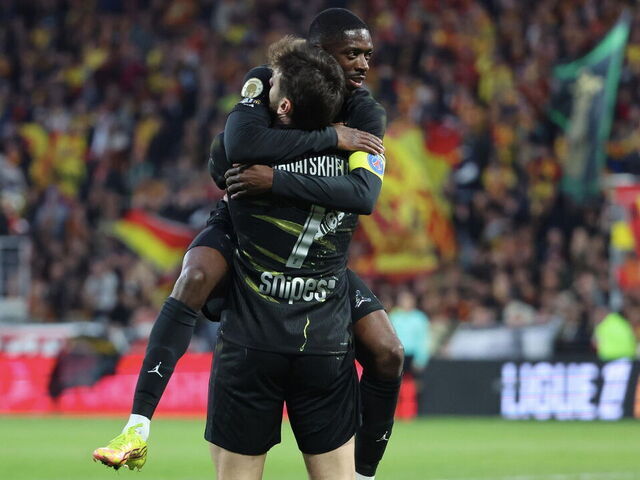 LENS, FRANCE - MAY 13: Khvicha Kvaratskhelia #7 of Paris Saint-Germain celebrate his first goal with Ousmane Dembélé #10 during the Ligue 1 McDonald's match between RC Lens and Paris Saint-Germain at Stade Bollaert-Delelis on May 13, 2026 in Lens, France.