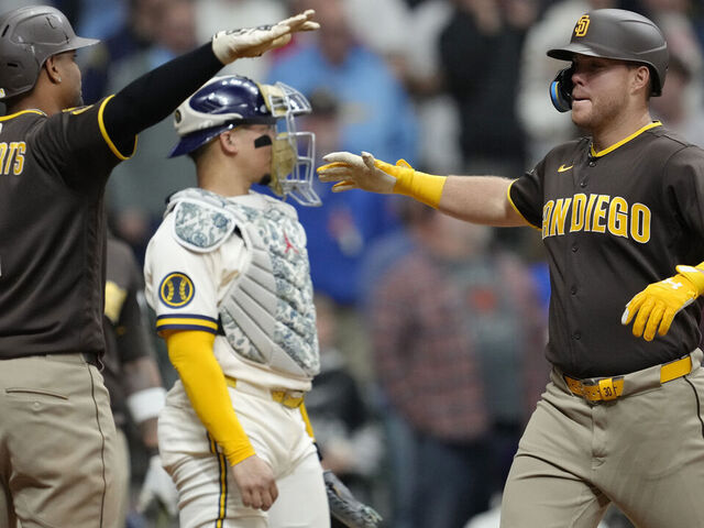 MILWAUKEE, WISCONSIN - MAY 13: Gavin Sheets #30 of the San Diego Padres celebrates with teammate Xander Bogaerts #2 after hitting a three-run home run against the Milwaukee Brewers during the ninth inning at American Family Field on May 13, 2026 in Milwaukee, Wisconsin.