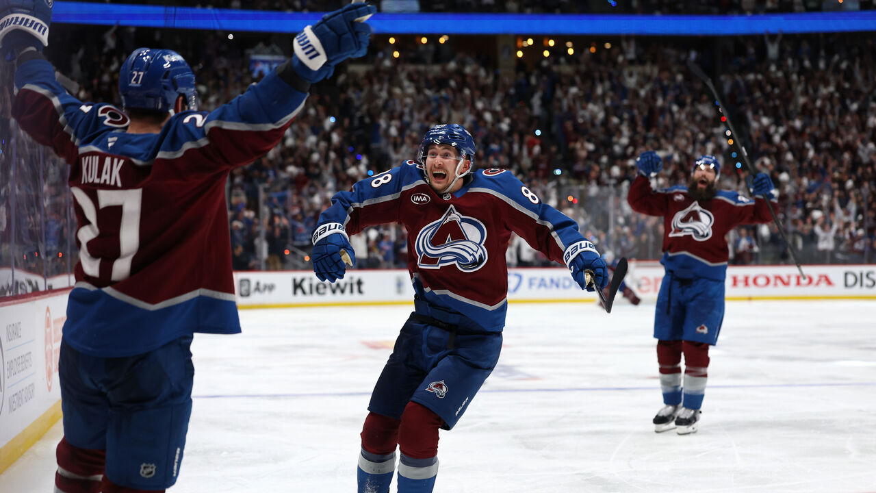 DENVER, COLORADO - MAY 13: Martin Necas #88 of the Colorado Avalanche celebrates the game winning goal scored by Brett Kulak #27 against Jesper Wallstedt (not pictured) #30 of the Minnesota Wild during overtime in Game Five of the Second Round of the 2026 Stanley Cup Playoffs at Ball Arena on May 13, 2026 in Denver, Colorado.