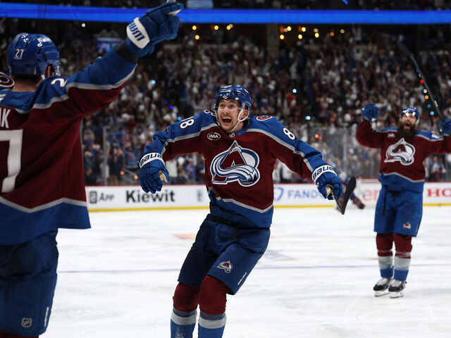 DENVER, COLORADO - MAY 13: Martin Necas #88 of the Colorado Avalanche celebrates the game winning goal scored by Brett Kulak #27 against Jesper Wallstedt (not pictured) #30 of the Minnesota Wild during overtime in Game Five of the Second Round of the 2026 Stanley Cup Playoffs at Ball Arena on May 13, 2026 in Denver, Colorado.