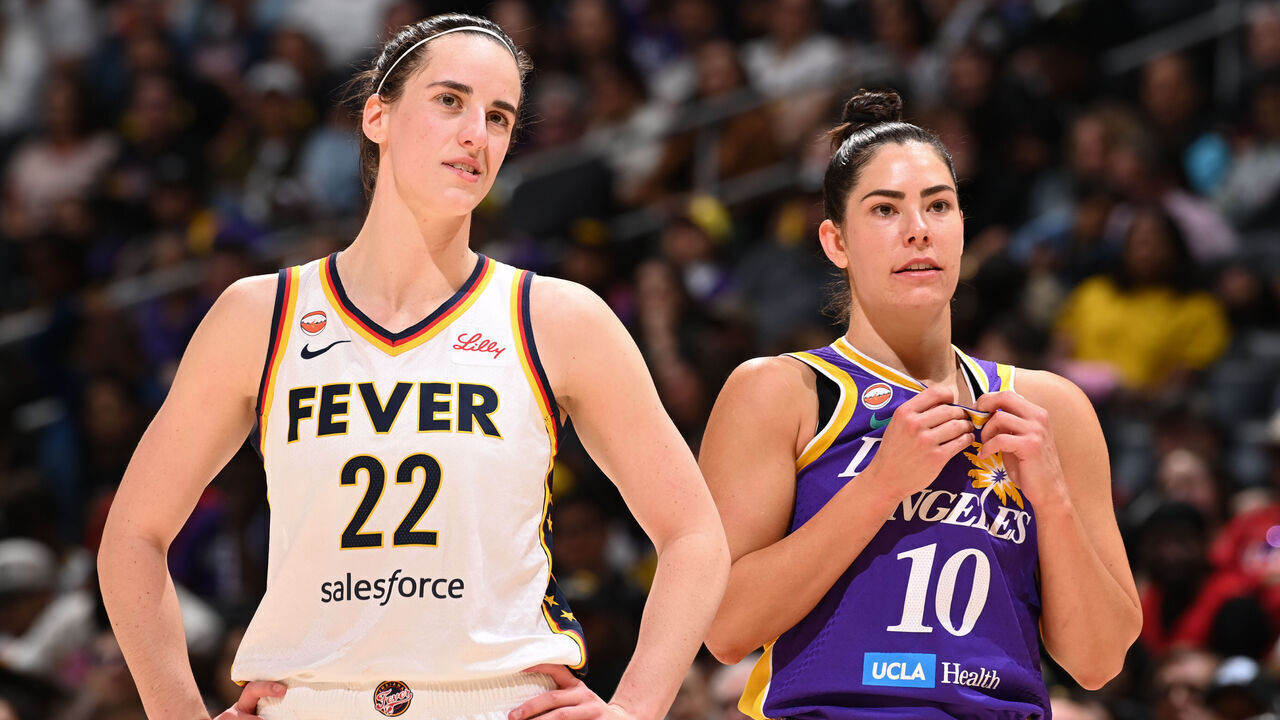 LOS ANGELES, CA - MAY 13: Caitlin Clark #22 of the Indiana Fever and Kelsey Plum #10 of the Los Angeles Sparks look on during the game on May 13, 2026 at Crypto.com Arena in Los Angeles, California. NOTE TO USER: User expressly acknowledges and agrees that, by downloading and/or using this Photograph, user is consenting to the terms and conditions of the Getty Images License Agreement. Mandatory Copyright Notice: Copyright 2026 NBAE