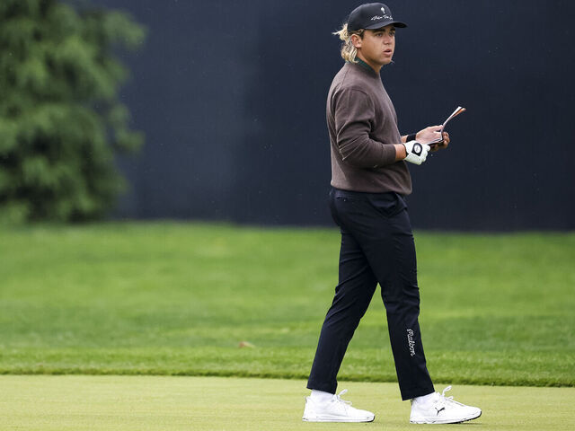 NEWTOWN, PENNSYLVANIA - MAY 14: Garrick Higgo of South Africa walks the first fairway during the first round of the PGA Championship at Aronimink Golf Club on May 14, 2026 in Newtown, Pennsylvania.